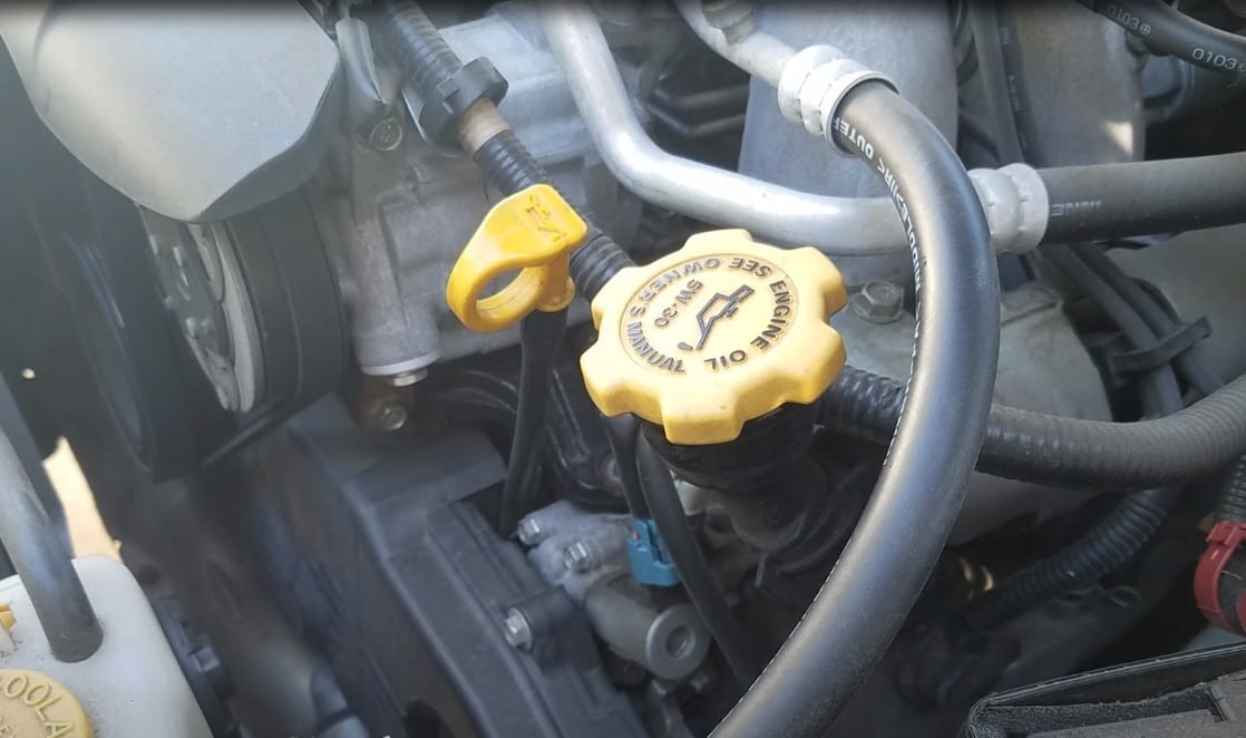 where should oil level be on dipstick