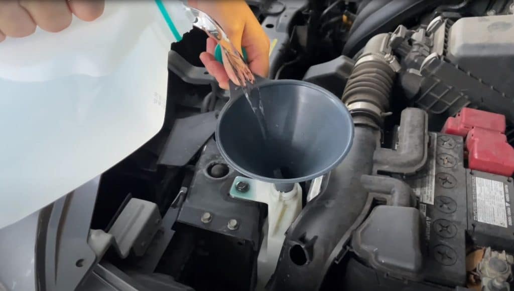 Why Is My Car Smoking Under The Hood? A Detailed Guide