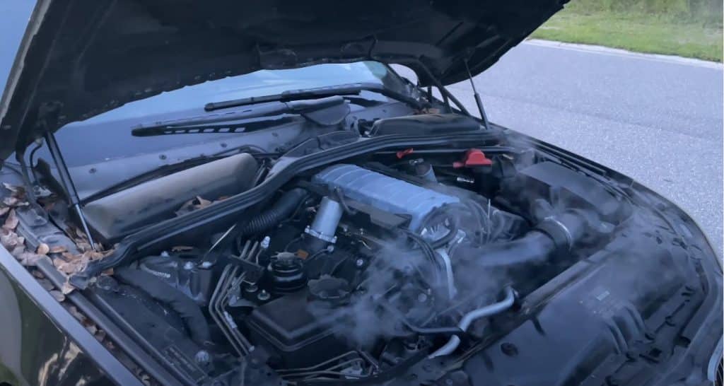 Why Is My Car Smoking Under The Hood? A Detailed Guide