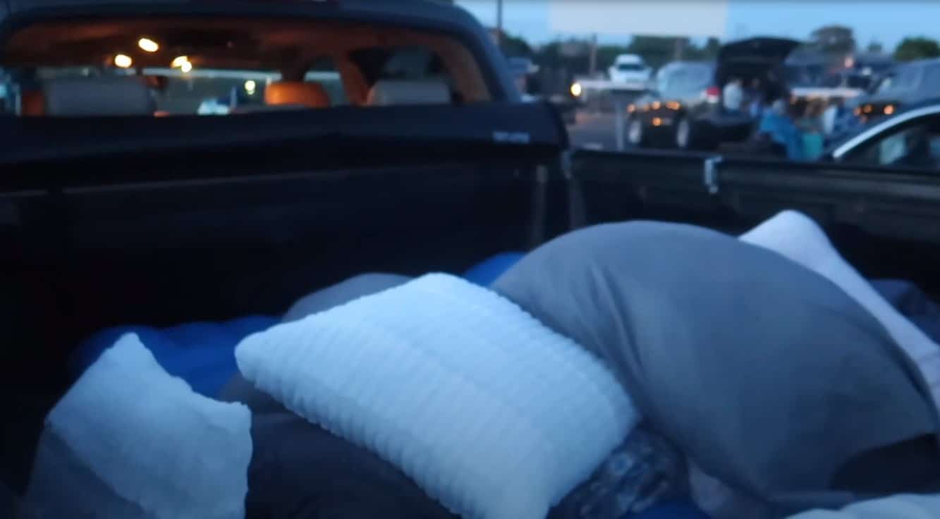 cuddling romantic truck bed date night